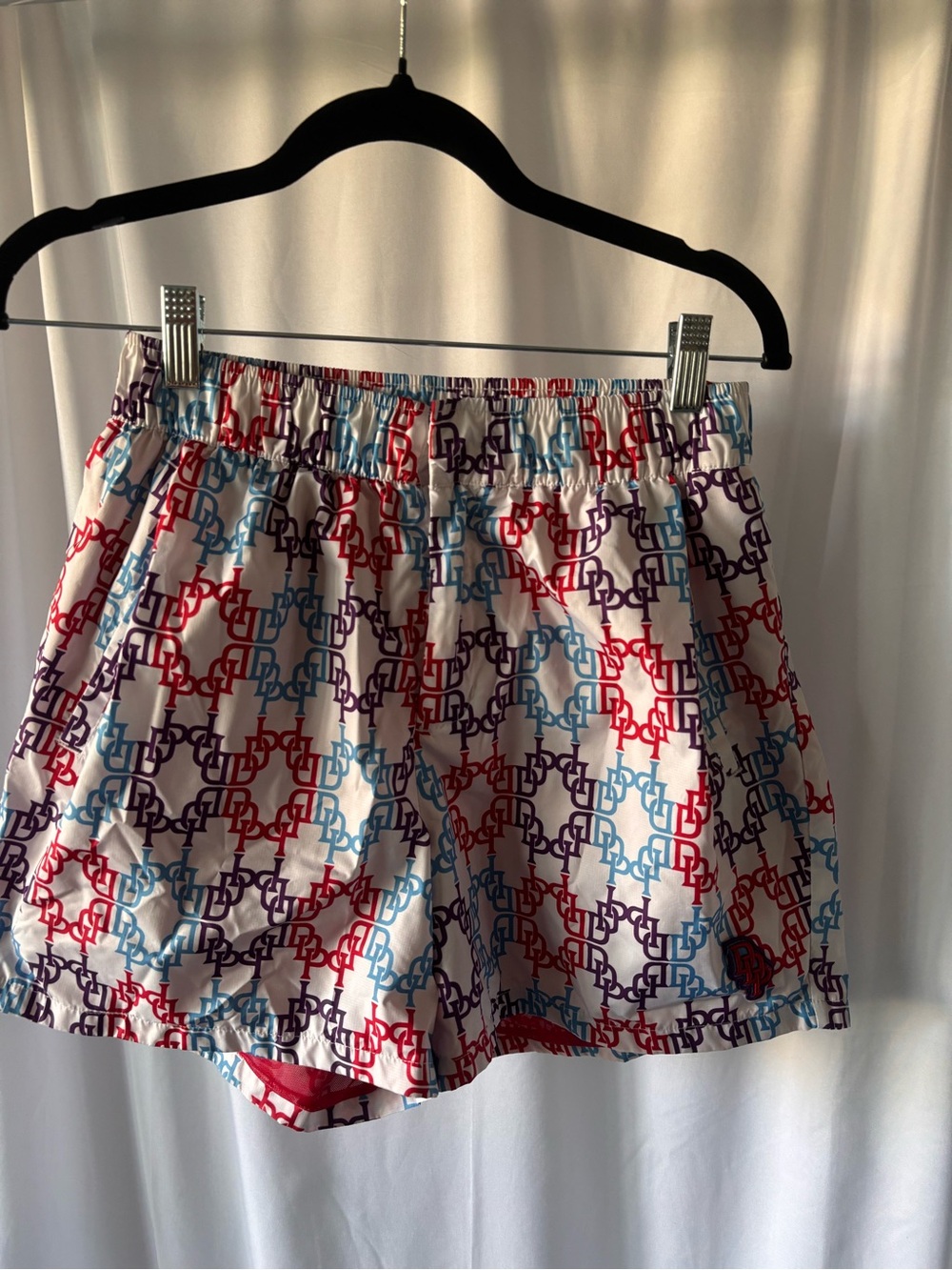Puma Dapper Multi-Color Logo Print Elastic Waist swim trunks